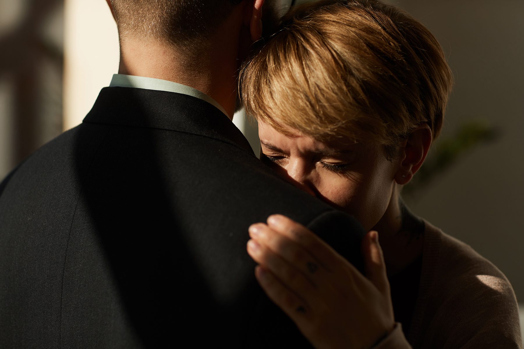 Suicide Prevention - Mother Crying on Shoulder